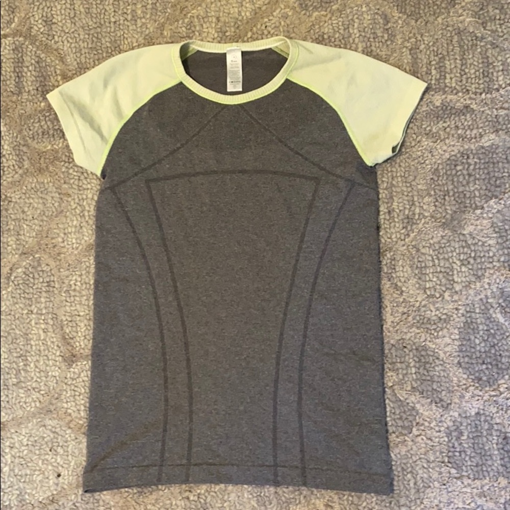 worn a few times athletic top with yellow accents